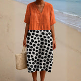 Pénélope - Robe Orange avec Points Contrastés