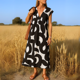 Magda - Robe fluide avec décolleté en V