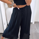 Maia - Pantalons Plissés Noirs